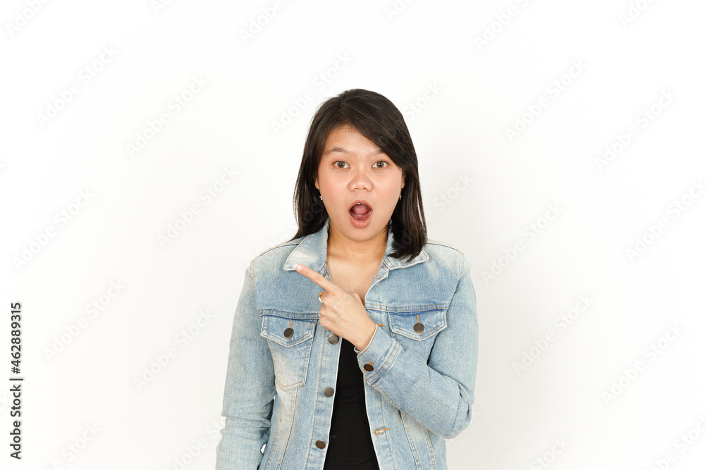 Showing and Pointing Left Side of Beautiful Asian Woman Wearing Jeans Jacket and black shirt Isolated On White Background
