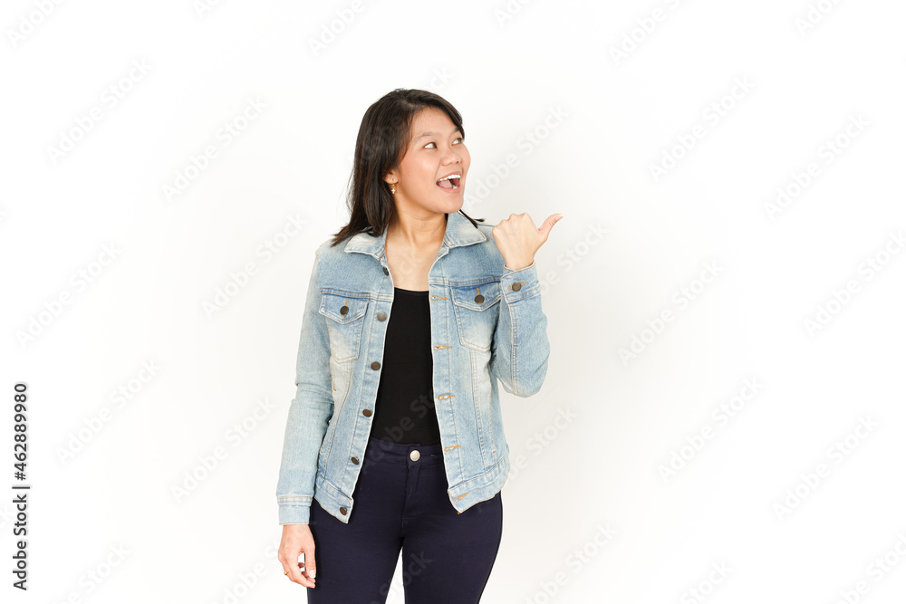 Pointing Right Side With Thumb of Beautiful Asian Woman Wearing Jeans Jacket and black shirt Isolated On White Background Pointing Right Side With Thumb of Beautiful Asian Woman Wearing Jeans Jacket and black shirt Isolated On White Background