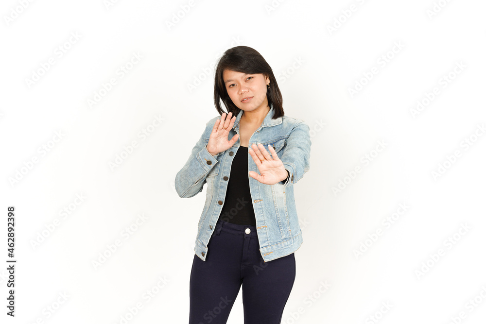 Stop hand gesture of Beautiful Asian Woman Wearing Jeans Jacket and black shirt Isolated On White Background Stop hand gesture of Beautiful Asian Woman Wearing Jeans Jacket and black shirt Isolated On White Background