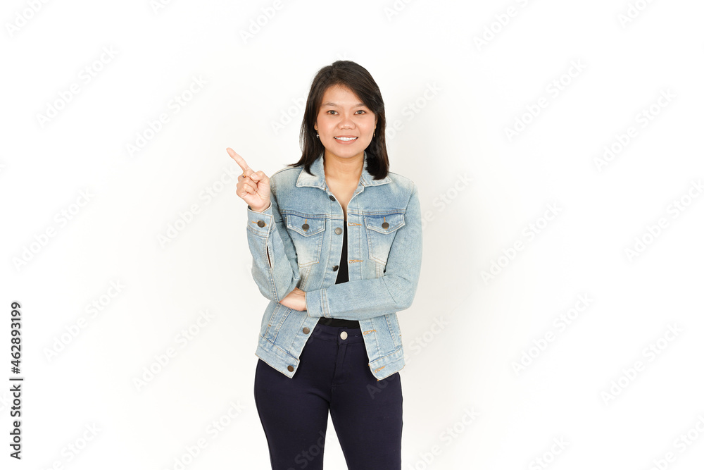 Presenting and Pointing Left Side of Beautiful Asian Woman Wearing Jeans Jacket and black shirt Isolated On White Background Presenting and Pointing Left Side of Beautiful Asian Woman Wearing Jeans Jacket and black shirt Isolated On White Background