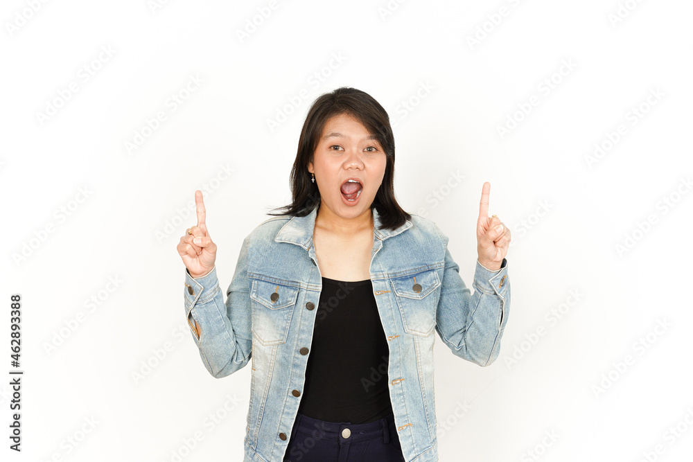 Pointing up and Presenting of Beautiful Asian Woman Wearing Jeans Jacket and black shirt Isolated On White Background Pointing up and Presenting of Beautiful Asian Woman Wearing Jeans Jacket and black shirt Isolated On White Background