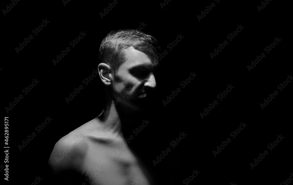 black and white dramatic photo of a man black and white dramatic photo of a man