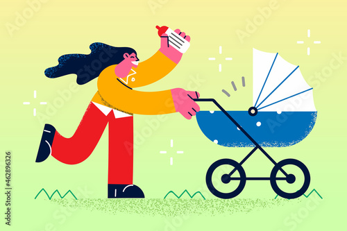 Happy motherhood and walking with baby concept