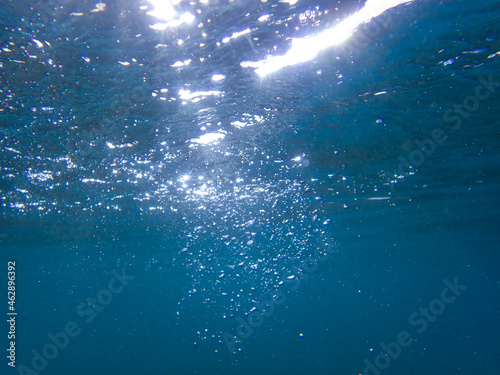Underwater bubbles, under the mediterranean sea, very suitable landscape picture for backgrounds, blue background of underwater bubbles