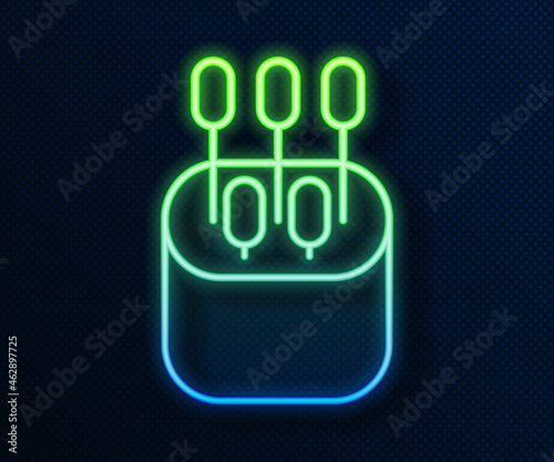 Glowing neon line Cotton swab for ears icon isolated on blue background. Vector Illustration © Oksana