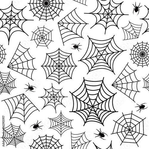 Spiderweb and spiders on a white background. Halloween texture for wallpaper, fill, web page background, surface texture.