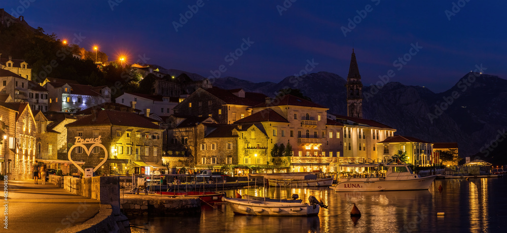 Sunset at the waterfront of the old town Perast in the Bay of Kotor in Montenegro.