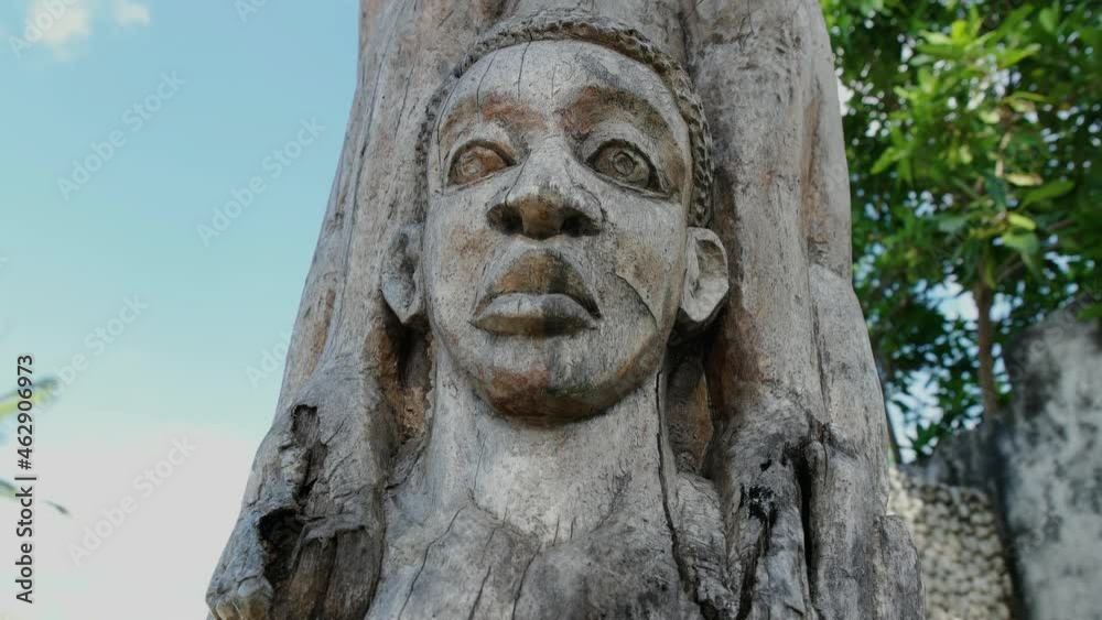 tree carving art statue with multiple faces tree carving art statue with multiple faces
