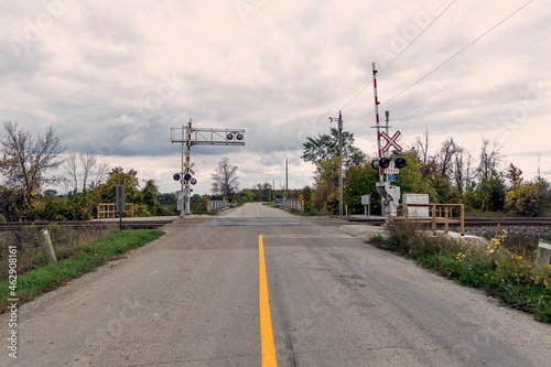 A rural railway crossing in the fall