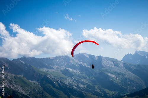 paragliding flight in the mountains. Le Grand-Bornand, France