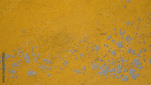 background texture stone wall painted with yellow paint, old scuffed surface vintage © Алёна Климова