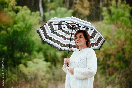 girl with umbrella in the woods