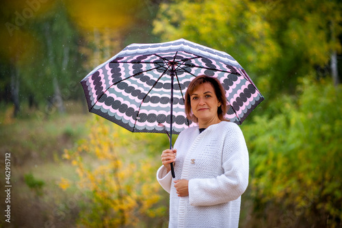 girl with umbrella in the woods
