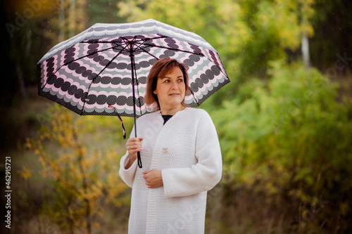 girl with umbrella in the woods