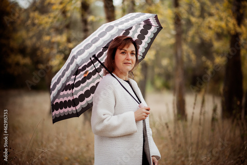 girl with umbrella in the woods
