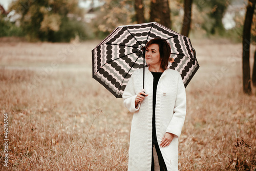 girl with umbrella in the woods