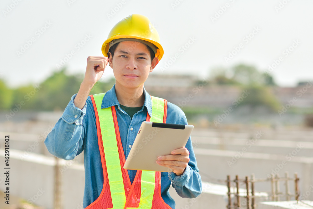 Engineer inspector on  site construction by tablet technology