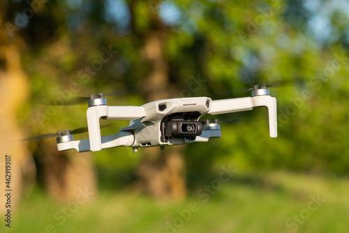 Little drone filming videos and stills, flying in the air