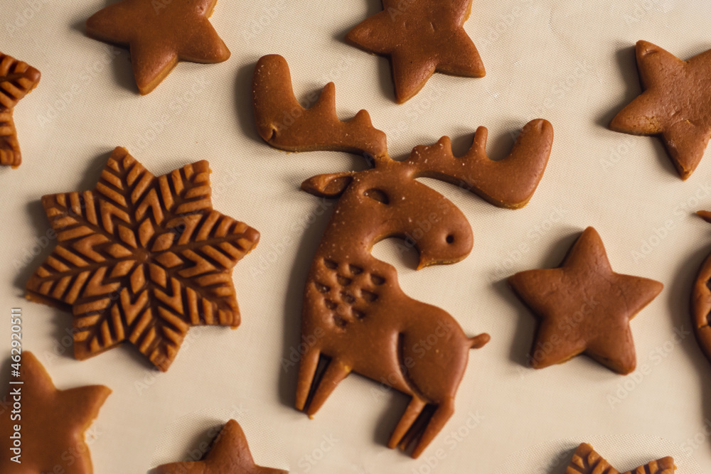 Pattern of Christmas gingerbread cookies in the form of animals, trees, snowflakes Pattern of Christmas gingerbread cookies in the form of animals, trees, snowflakes