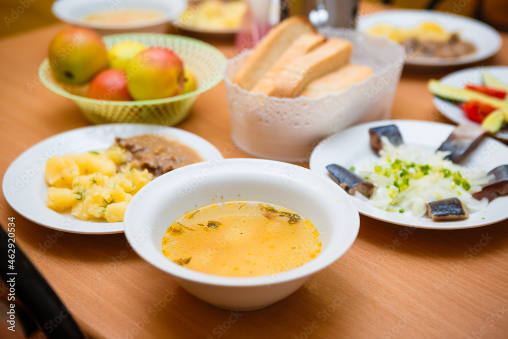 Traditional food in Russia. Soup, herring and potatoes. Russian national food. Traditional food in Russia. Soup, herring and potatoes. Russian national food.