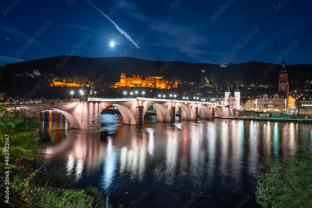 Old town of Heidelberg at night with Heidelberg Castle and Old Bridge