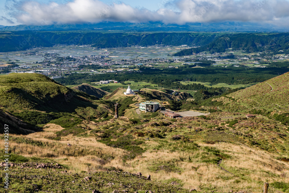 Scenic high angle view on Aso town, abandoned buildings, and walk way from mountain Aso in Kyushu, Japan