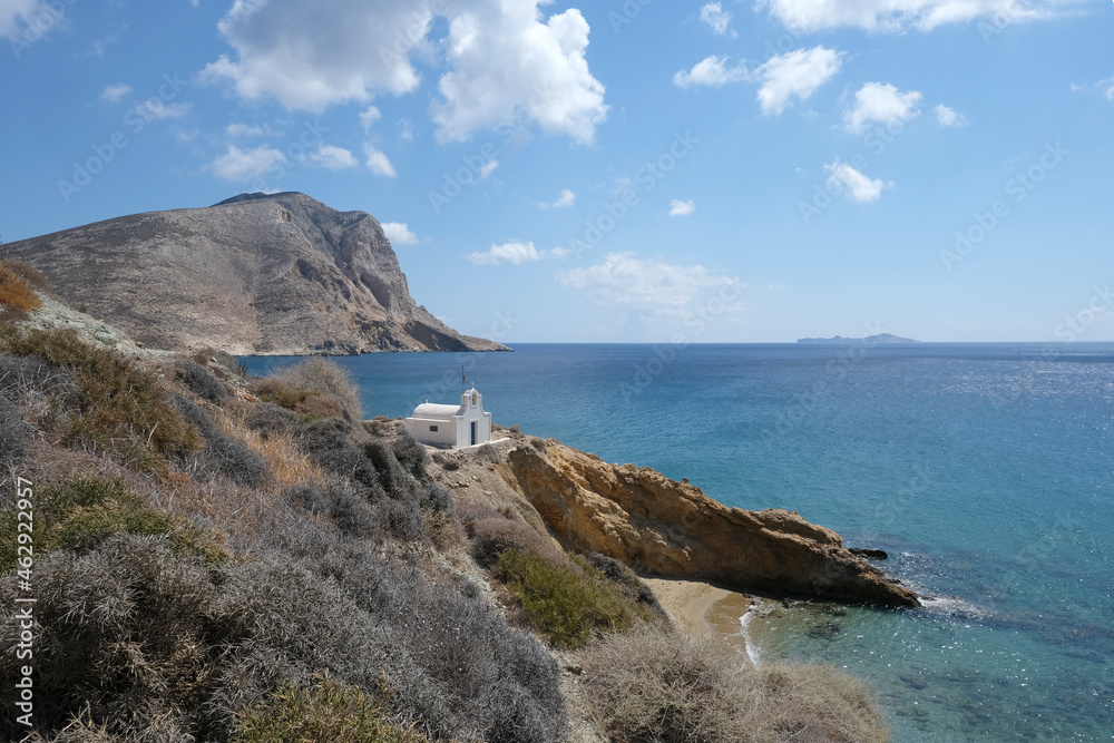 Anafi island - View on the coast, Anargyri beach lonely sandy shore and the eponymous small church. Cyclades islands, Greece
