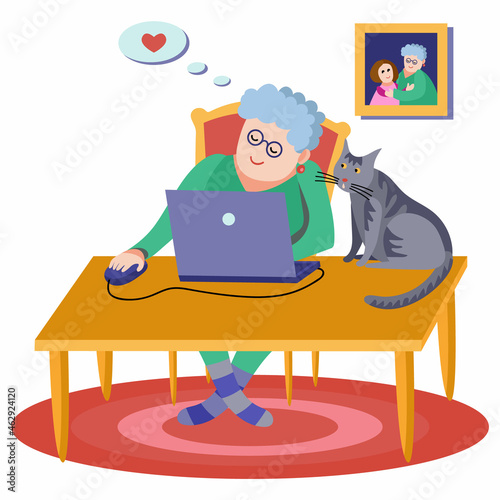 Vector flat illustration of happy granny sitting at the table with laptop and cat.Old lady communicating with grandchildren via Internet.Character design for advertising,prints,stickers,design