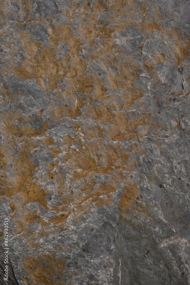 Gray stone background. Iron impurities. Vertical image. Gray stone background. Iron impurities. Vertical image.