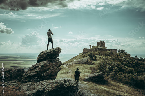 person on the top of the mountain