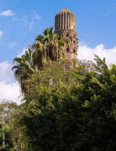 The old minaret of the Al Hakim Mosque in old Cairo photo