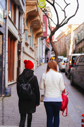 friends walking on the street.