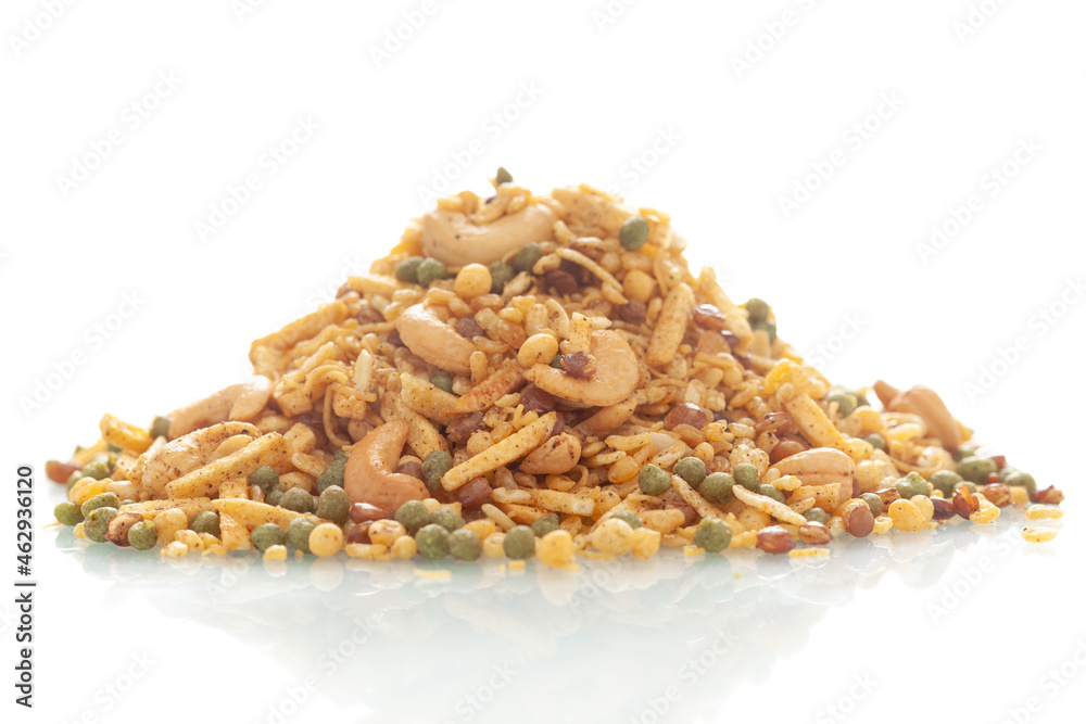 Close-up of Rich Spicy Kaju Mixture Indian namkeen (snacks), Indian spicy snacks (Namkeen), in a pile or heap, isolated over white background Close-up of Rich Spicy Kaju Mixture Indian namkeen (snacks), Indian spicy snacks (Namkeen), in a pile or heap, isolated over white background