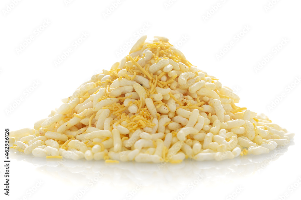 Close-up of Lemon Bhel Puffed Rice small besan sev Indian spicy snacks (snacks), Indian spicy snacks (Namkeen), in a pile or heap, isolated over white background Close-up of Lemon Bhel Puffed Rice small besan sev Indian spicy snacks (snacks), Indian spicy snacks (Namkeen), in a pile or heap, isolated over white background