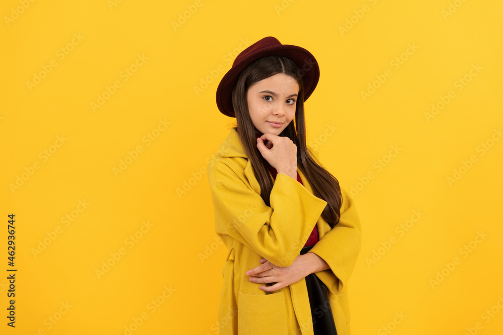 cheerful kid in stylish hat. teen beauty. female fashion model. girl wearing trendy fall clothes cheerful kid in stylish hat. teen beauty. female fashion model. girl wearing trendy fall clothes