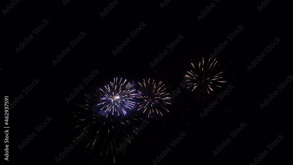 Loop seamless of real fireworks with abstract blur bokeh lights in night sky. Glowing fireworks festival. New year's eve 2022 fireworks celebration Loop seamless of real fireworks with abstract blur bokeh lights in night sky. Glowing fireworks festival. New year's eve 2022 fireworks celebration
