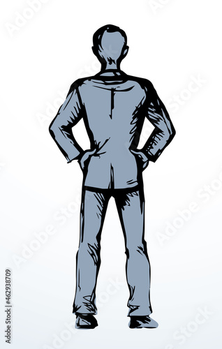 Standing man. Back view. Vector drawing © Marina