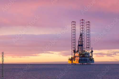 Jackup moveable oil platform at sunset in Gulf of Mexico