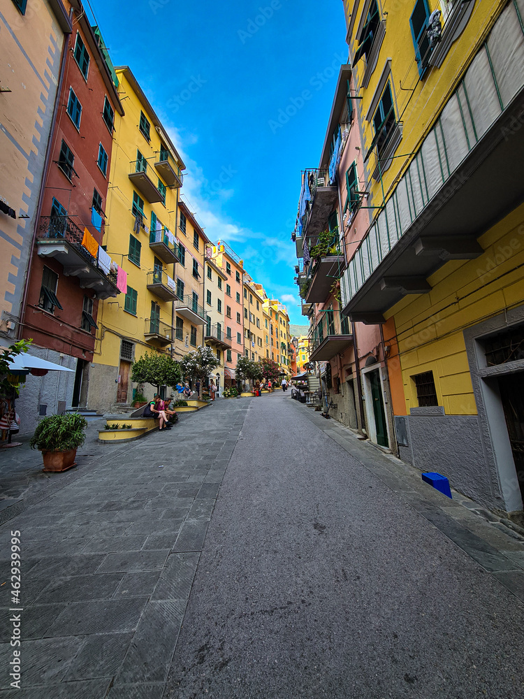 Main street of the village of riomaggiore, cinque terre, Italy. The alleys of riomaggiore full of colors never forget