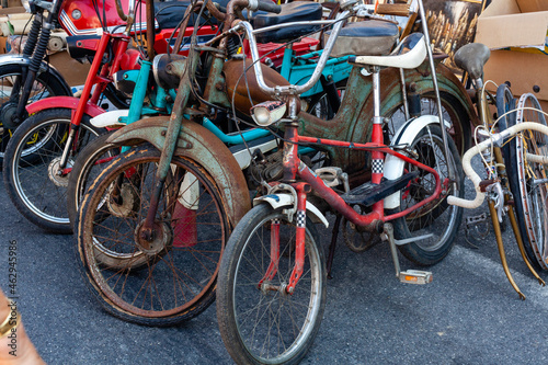 old rusty bicycles in the street antique market photo