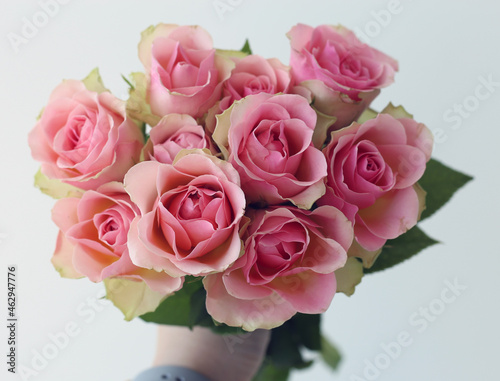 A bouquet of pink roses photographed from above. © Nora