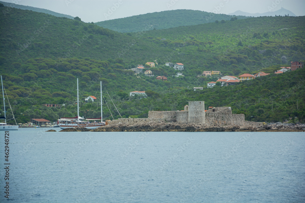 Old fortress and seascape in Montenegro, view from the sea