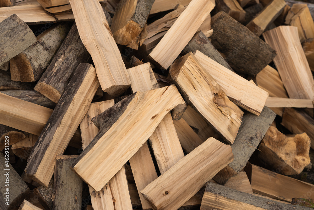 Wooden natural log closeup. Stack of fire wood Wooden natural log closeup. Stack of fire wood