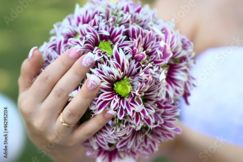 Fototapeta Naklejka Na Ścianę i Meble -  wedding bridal bouquet in delicate lilac flowers