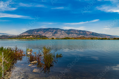 Butrint lake salt lagoon, beautiful summer view from Butrint National Park, the famous UNESCO World Heritage Site in Albania, archeological site in Ksamil not far from Sarande on the south of Albania. photo