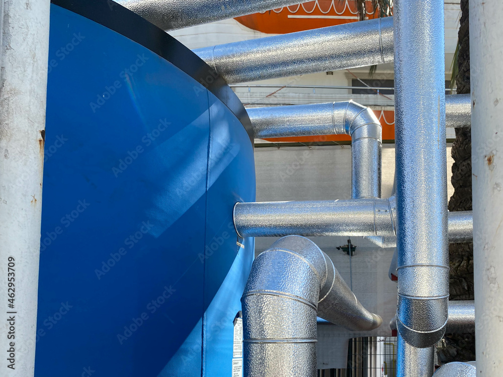 Demonstration of materials for pipe insulation. Thermal insulation of