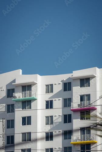 modern apartment building colors sky blue Miami Florida balcony residential real state 