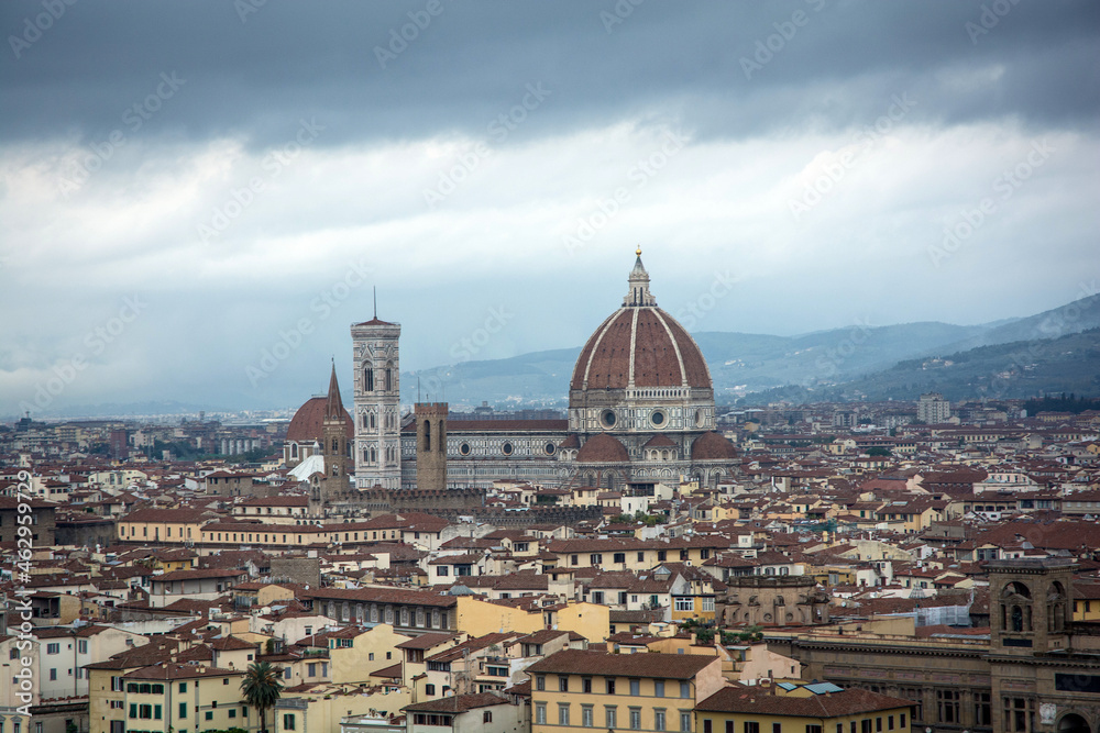 Fototapeta premium Overlooking the City of Florence with the Terracotta roofs. Moody sky. 2015
