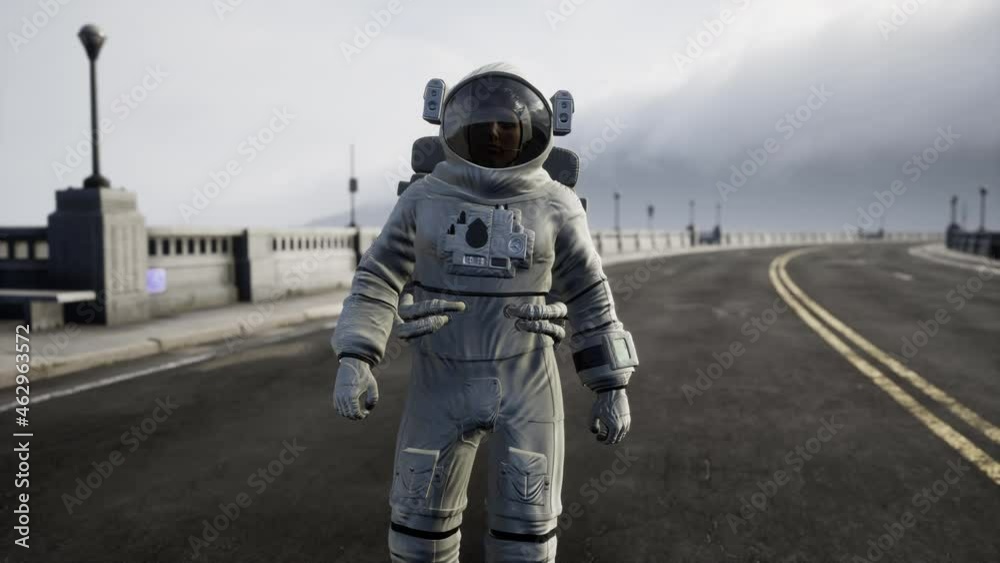 astronaut in space suit on the road bridge