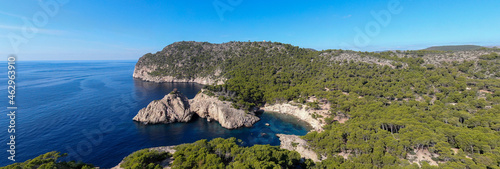 Panoramic photo of Calo des Monjo beach in Mallorca. Beautiful view of the  seacoast of  Mallorca with an amazing turquoise sea, in the middle of the nature. Concept of summer, travel, relax and enjoy photo